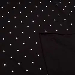 Jednolícní úplet černý bílými puntíky